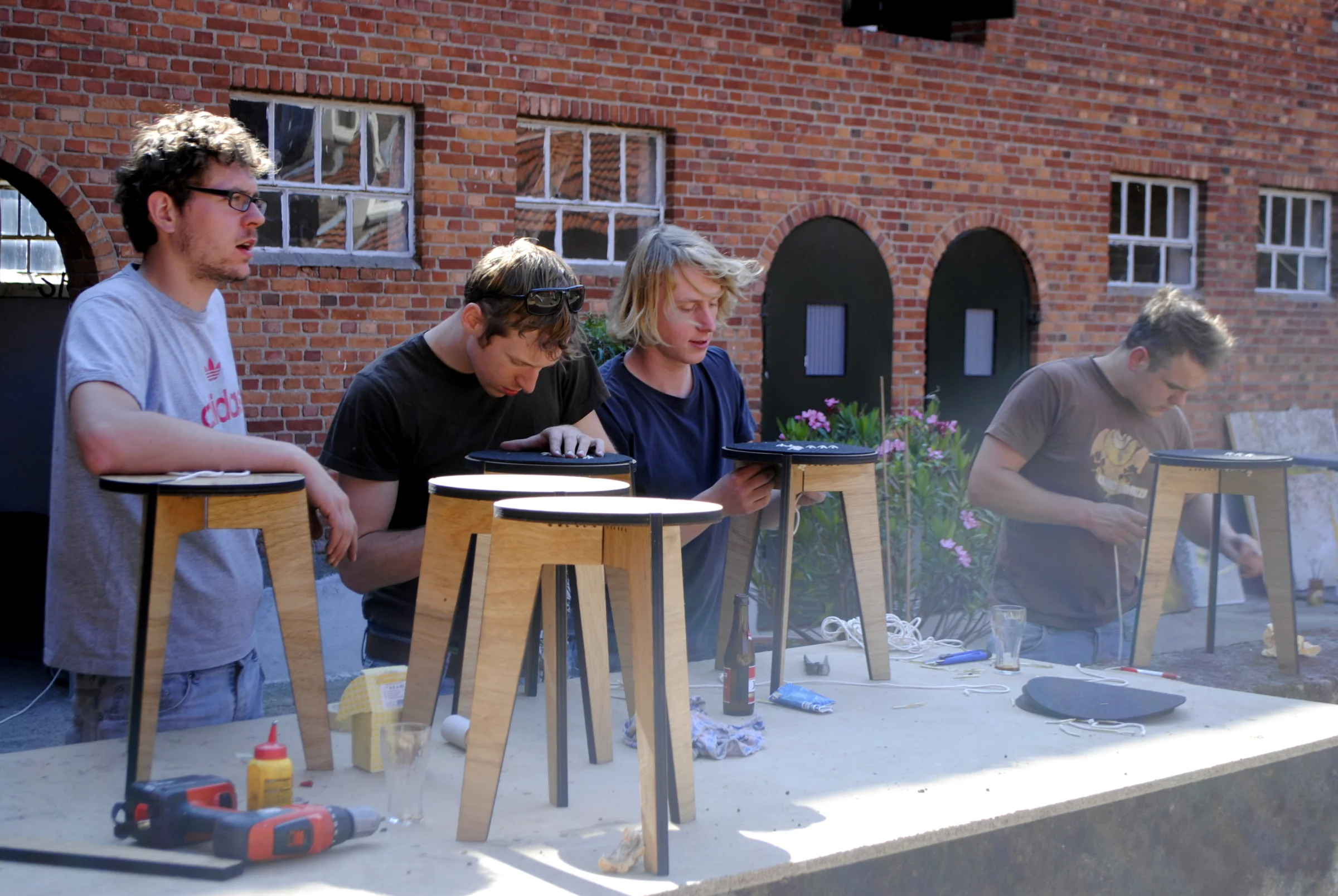 The four furniture designers behind Stal Collectief in their shared workshop